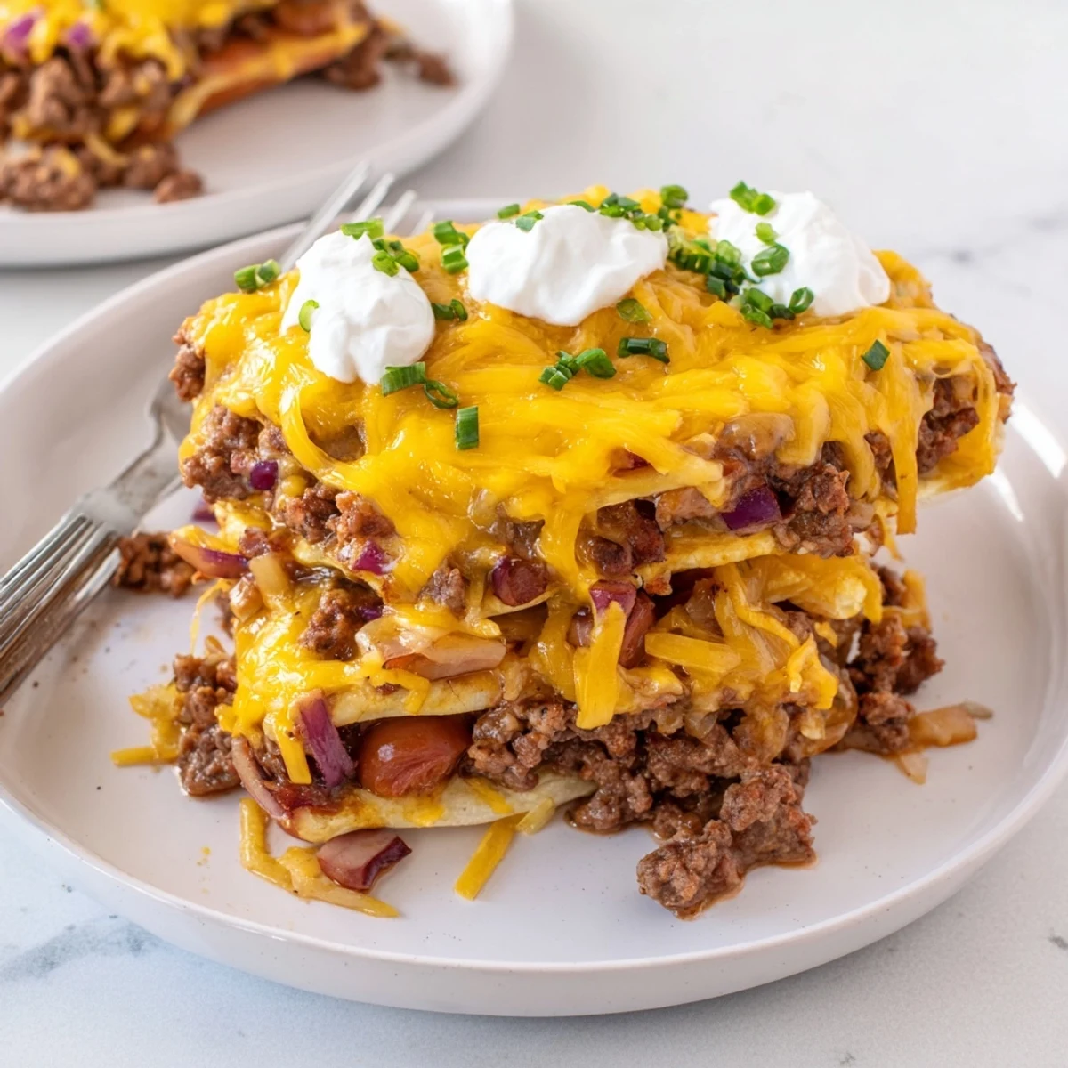 Deliciously cheesy Chili Dog Casserole fresh out of the oven, perfect for gatherings.