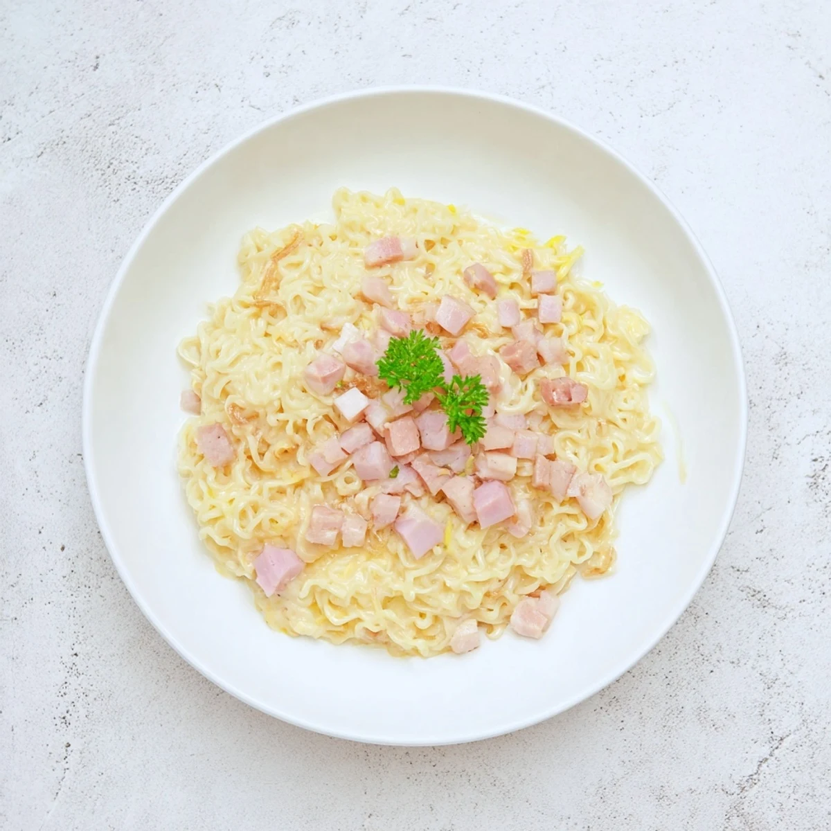 Golden, cheesy Carbonara Ramen Fusion, swirled and ready to be served for a quick dinner.