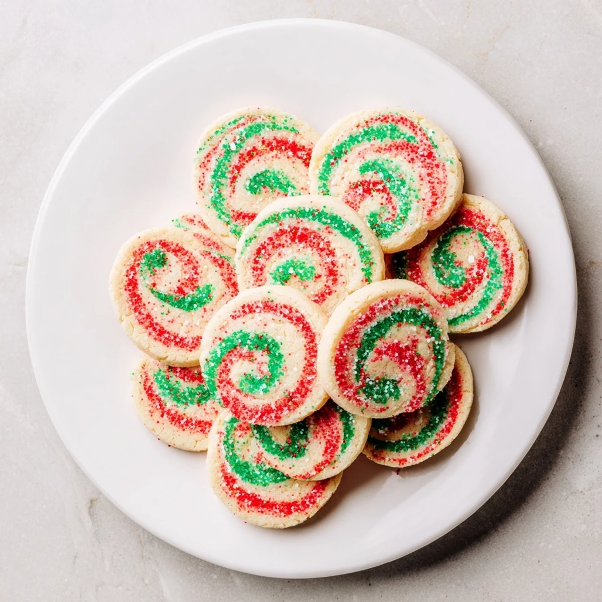 Festive Holiday Pinwheel Cookies, swirled with red and green, offering a delicious buttery flavor for the holidays.