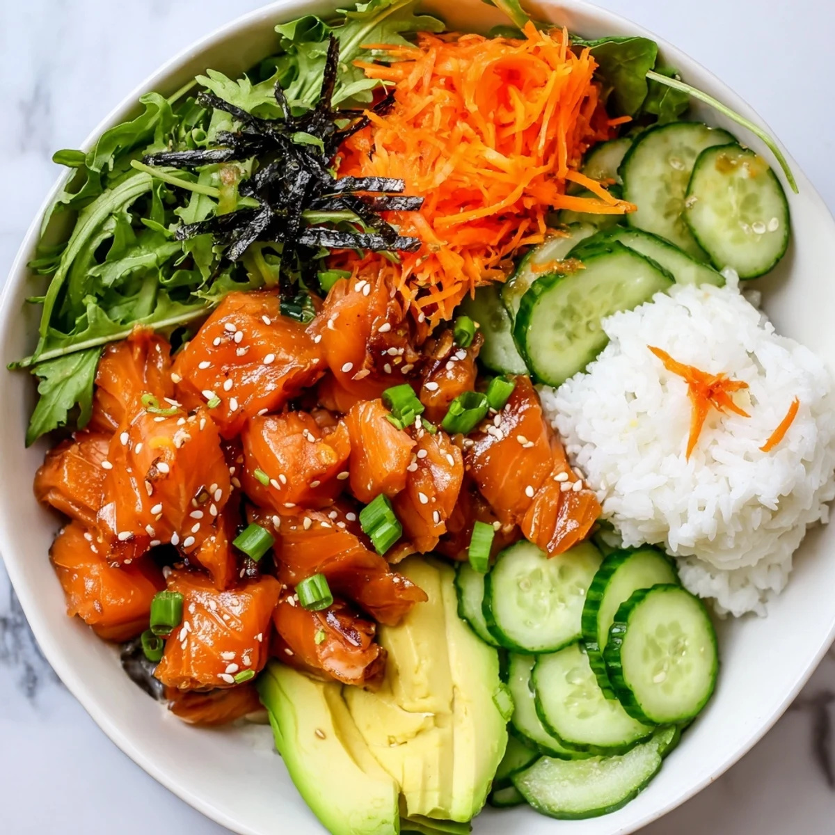 A close-up shot of a refreshing poke bowl salad, featuring sesame seeds and nori strips.