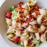 The dish features smoky crumbled bacon and a light, creamy mayo dressing, perfect for a refreshing, satisfying American main dish lunch.  