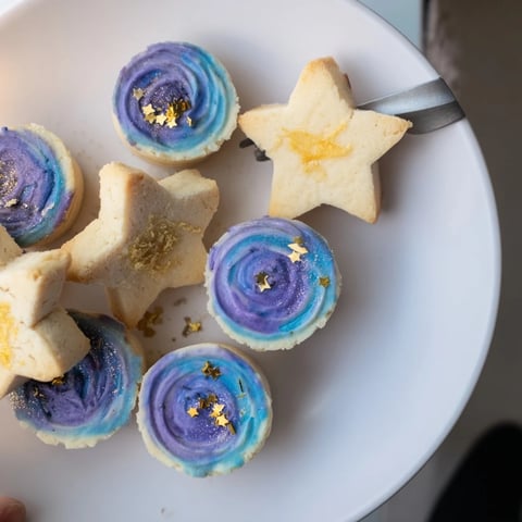 Stargazers Dessert Platter: a vibrant array of star-shaped shortbread and galaxy mousse, ready to serve.