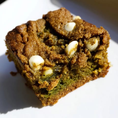 Indulge in chewy matcha pumpkin blondies, a perfect seasonal dessert treat.  