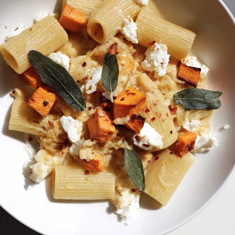 This Viral Sweet Potato Goat Cheese Sage recipe showcases tender pasta with a rich, savory sauce.