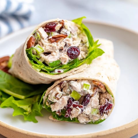 Golden-brown toasted pecans mingle with juicy cranberries in this flavorful Cranberry Pecan Chicken Salad wrap.