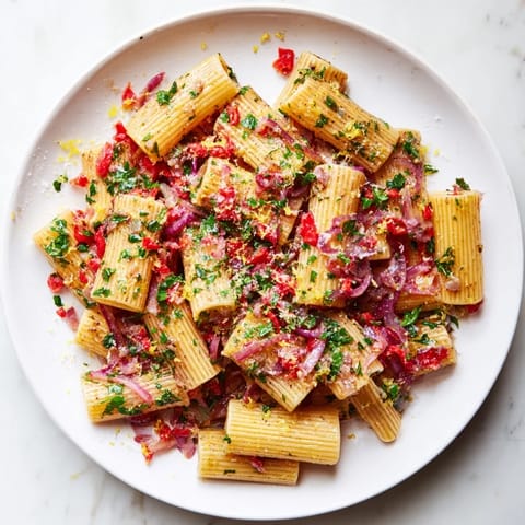 Steam rises from the vibrant One-Pot Diavola Spicy Pasta, a fiery Italian delight.